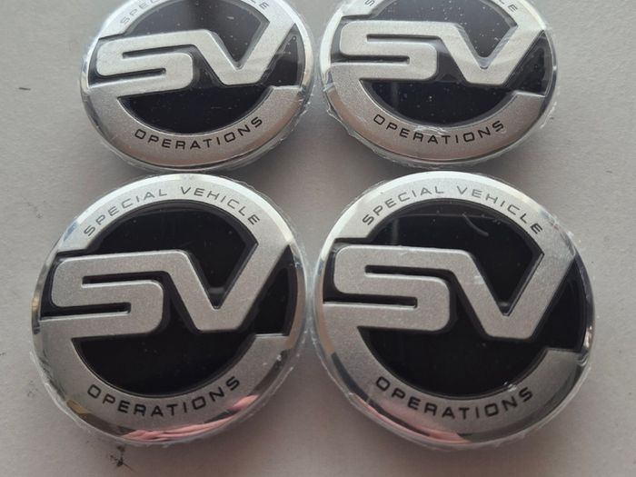 4 x Land Rover Special Vehicle Centre caps.  FREE POST