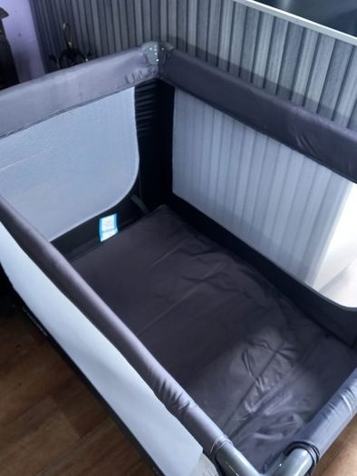 travel cot and balls