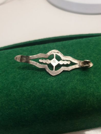 small silver brooch