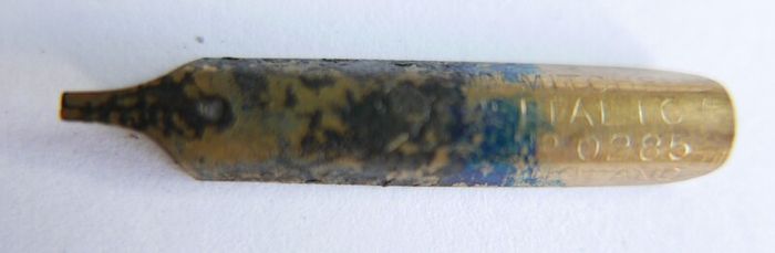Vintage dip pen with collection of assorted nibs