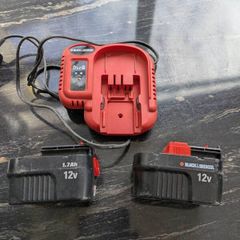 Black and Decker charger and 2 12v batteries