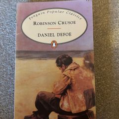vintage paperback copy of Robinson Crusoe by Daniel Defoe