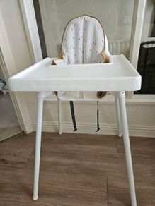 high chair with tray and cushion