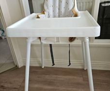 high chair with tray and cushion