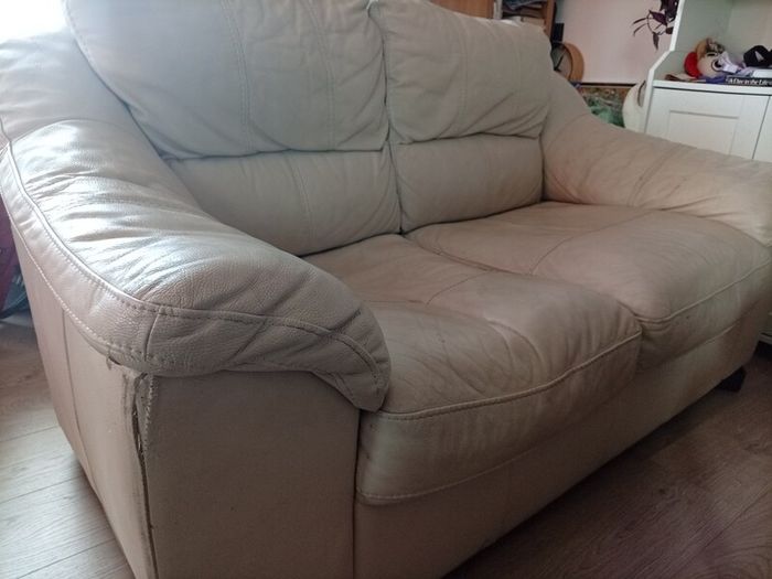 2 cream leather 2 seater sofa s