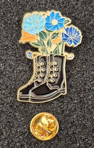 Doc Martin boots , pin back badge.