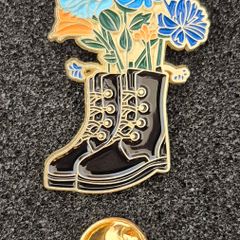 Doc Martin boots , pin back badge.