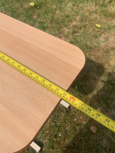Adjustable height table for the infirm