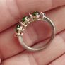 A 925 sterling silver ring with green and pink stones. Image 3