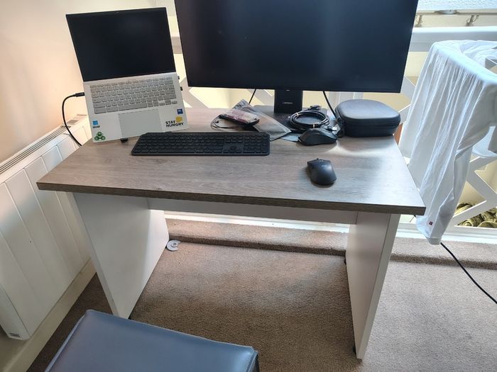 Compact wooden desk with white frame