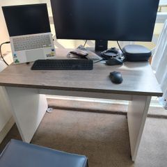 Compact wooden desk with white frame