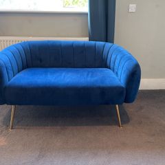Blue velvet sofa