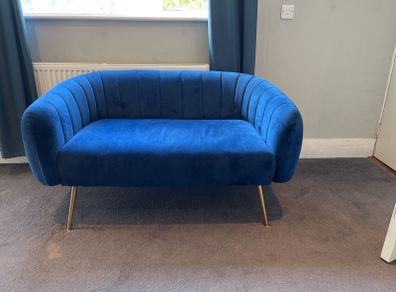 Blue velvet sofa