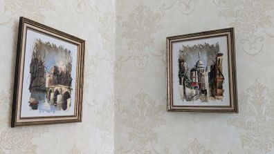 Pair of framed Parisian city scene prints