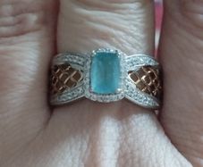 A classic ring with a  grandidierite and stones, crafted from 925 sterling silver with a platinum finish.