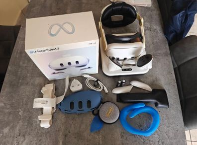 Meta Quest 3 with charging dock, rechargeable batteries, extra lenses, the back strap