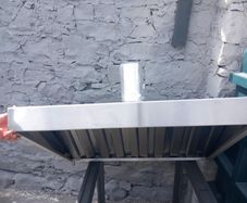 Range hood with an axial duct fan