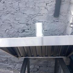 Range hood with an axial duct fan