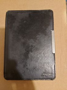 Amazon Kindle in lovely Black leather case, displaying error code 2