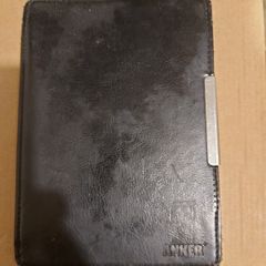 Amazon Kindle in lovely Black leather case, displaying error code 2