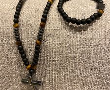 Beaded necklace and bracelet with cross symbols