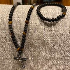 Beaded necklace and bracelet with cross symbols