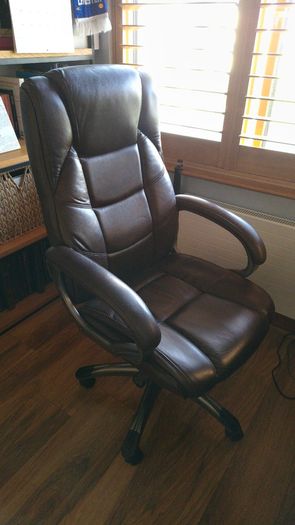 Good quality brown leather office swivel chair