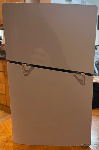 PS5 Digital with 1 Dual sense controller and steering wheel