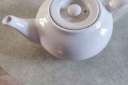 Vintage small white tea pot.