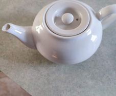 Vintage small white tea pot.