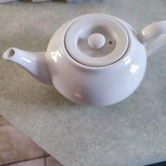 Vintage small white tea pot.