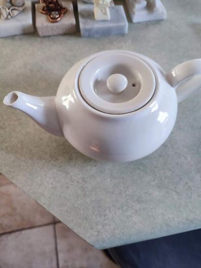 Vintage small white tea pot.