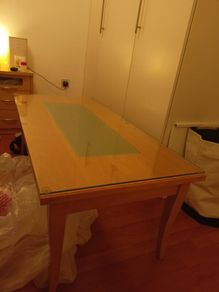 Glass topped coffee table