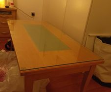 Glass topped coffee table