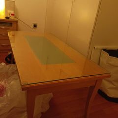 Glass topped coffee table