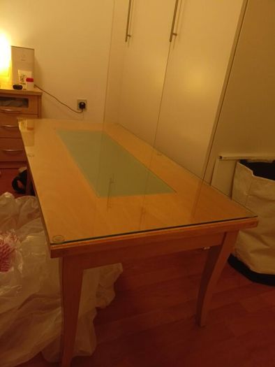 Glass topped coffee table