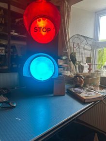 Train lighting red and green like traffic lights without the amber.