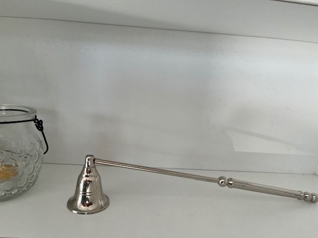 Metal Handle Candle Snuffer. Silver Finish. Moveable Head. With Hanging Tea Light. In Excellent Condition.