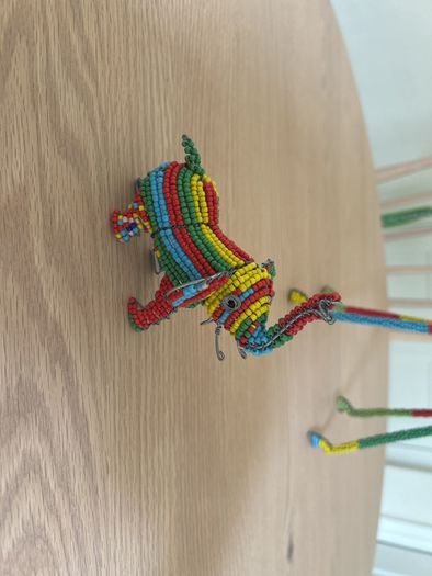 Hand beaded giraffe and elephant