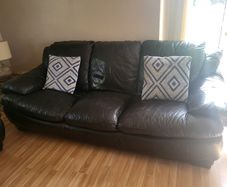 3 & 2 seater black leather sofas.