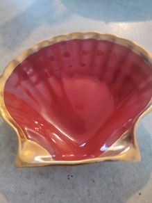TRINKET  OR SOAP DISH This shell dish is shaped like a shell and handmade. It is made of high fired Burgundy clay in France and it has a long tradition in this manufacture. The clay is covered with a very hard glaze and this makes it resistant to scratche