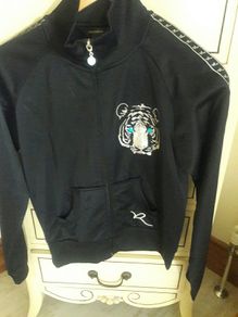 Black Rocawear zip up jacket.