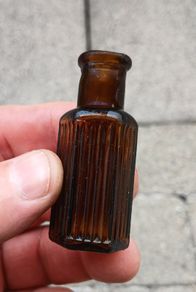 small poison bottle