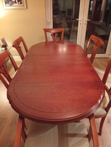 dining table and chairs and wall unit