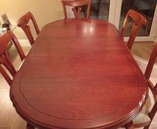 dining table and chairs and wall unit
