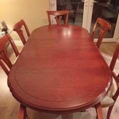 dining table and chairs and wall unit
