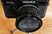 Yashica FX-D Quartz compact, manual-focus 35mm SLR film camera + 3 lenses.