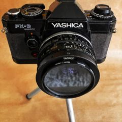 Yashica FX-D Quartz compact, manual-focus 35mm SLR film camera + 3 lenses.