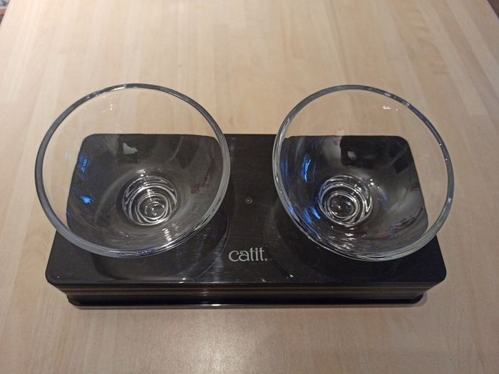cat double glass bowls with stand, priced to sell