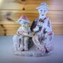 Vintage Porcelain Man with a Girl Eating WaterMelon God Log Image 3